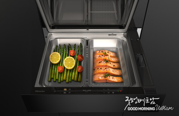 The new Miele steam drawer, when combined with a 45 cm compact oven with microwave in a 60 cm niche, forms a space-saving 3-in-1 solution for baking, reheating and steam cooking, with two separate steam cooking containers for preparing different food at the same time. Coming March 2027. (Photo: Miele)